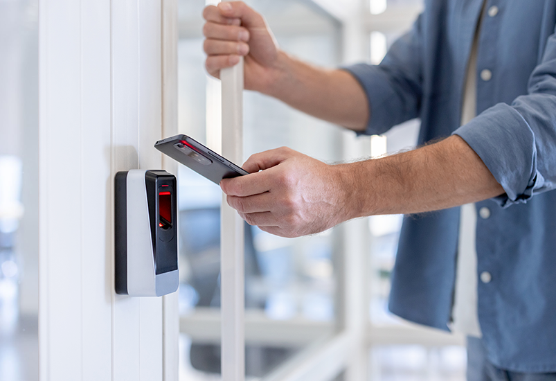 person using access control reader